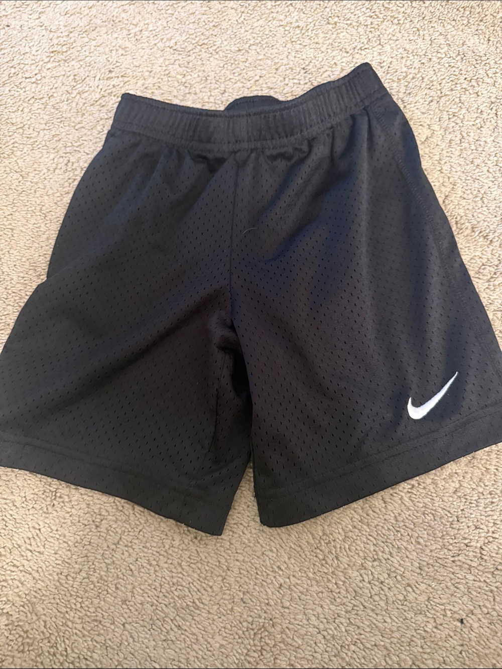 Nike Black Mesh Athletic Shorts with White Swoosh
